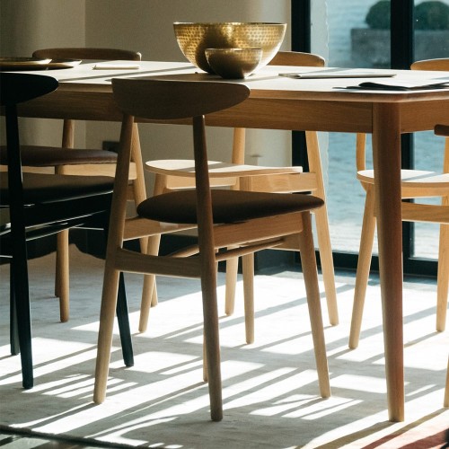 Upholstered Teo chair with natural oak armrests Vincent Sheppard
