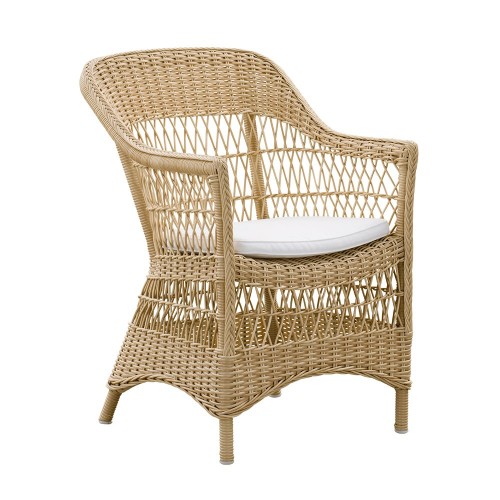 Charlot armleunstoel naturel met zitkussen Sika Design
