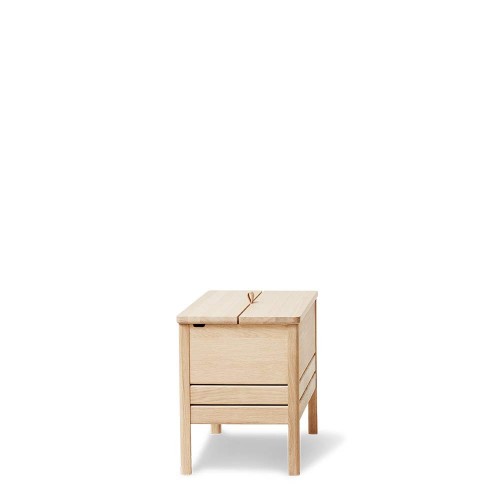 A Line 68 storage bench - white oak