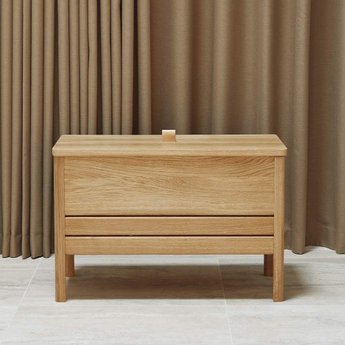 A Line 68 storage bench - oak