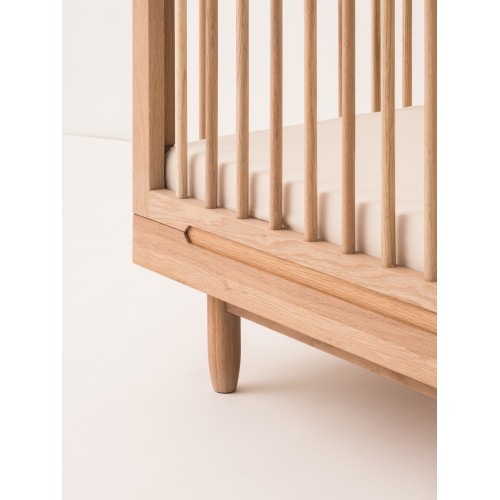 Pure convertible crib in solid oak