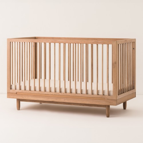 Pure evolutief babybedje in massief eikenhout