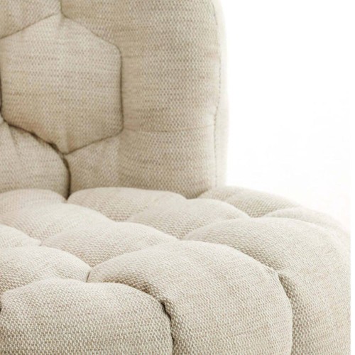 Fauteuil design Amara en tissu crème